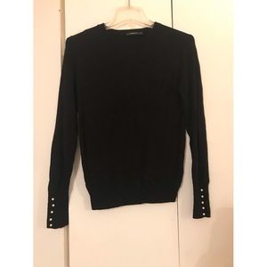 Black crew neck sweater